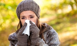 Woman suffering from a cold