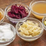 Fermented foods to add to your list of foods to eat: sauerkraut, yogurt, kefir, kimchi, natto, olives