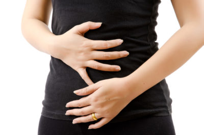 Woman suffering from Leaky Gut Syndrome