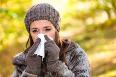 Woman suffering from a weakened immune system