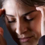 Woman with headaches