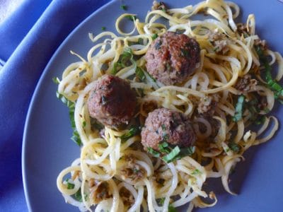 Yellow squash noodles with meatballs and olive tapenade